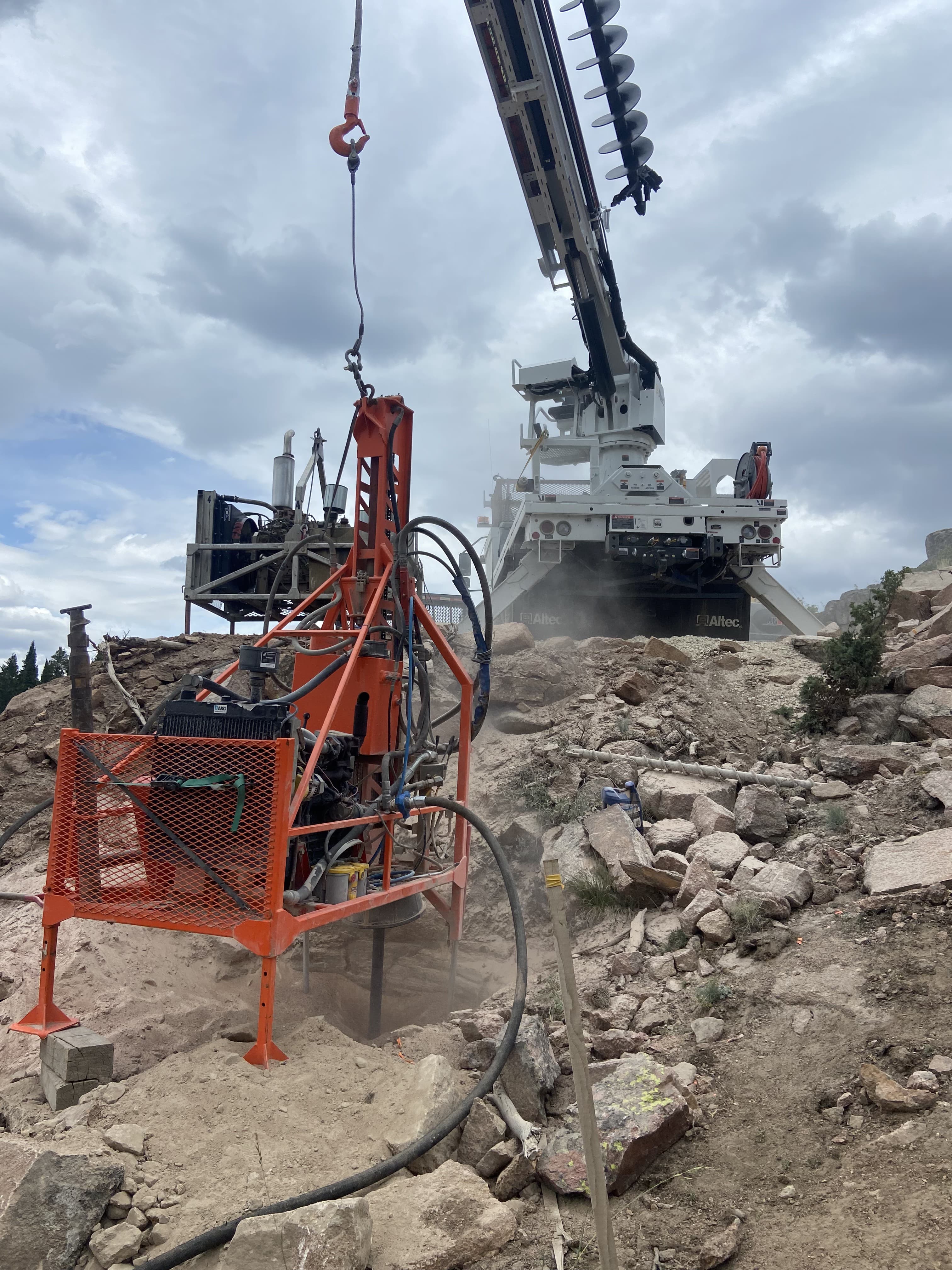 Heli-portable drill rig on a transmission site